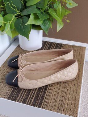 ALDO tan and black quilted ballet flats